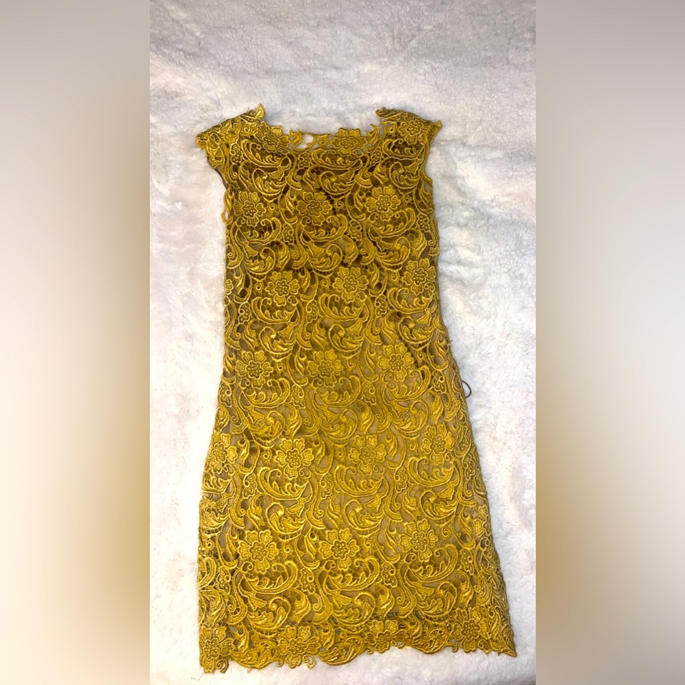 Prada lace. No brand dress. It’s hand made